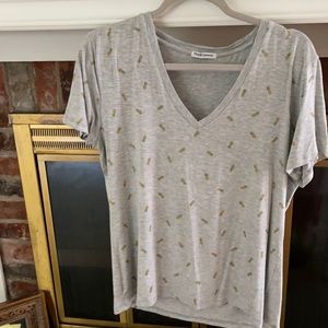 Size Large grey cap sleeve t shirt with pineapples